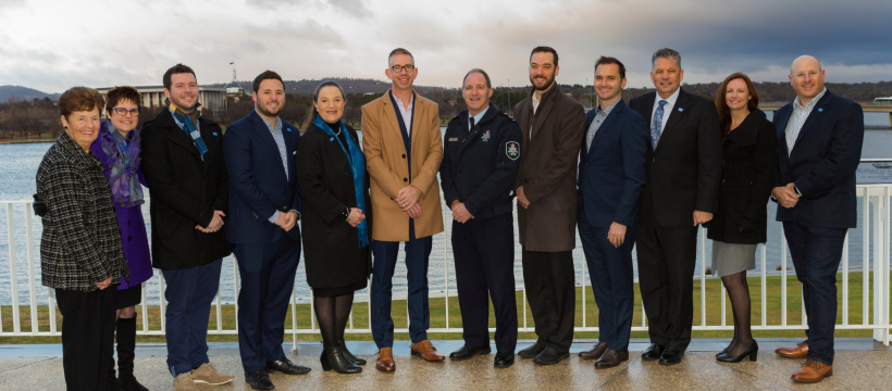 Representatives from Crime Stoppers ACT, McDonalds and ACT Policing celebrate funds raised during Crime Stoppers Week 2018.