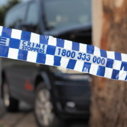 Car accident in Canberra with police tape.