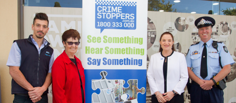 Representatives from Neighbourhood Watch, ACT Region Crime Stoppers, ACT Policing and local retailers launch the Local Suburbs Awareness Campaign.